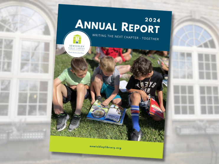 Cover of the 2024 Annual Report featuring 3 young boys reading a book together on the lawn. The background features the arched windows of the library patio.