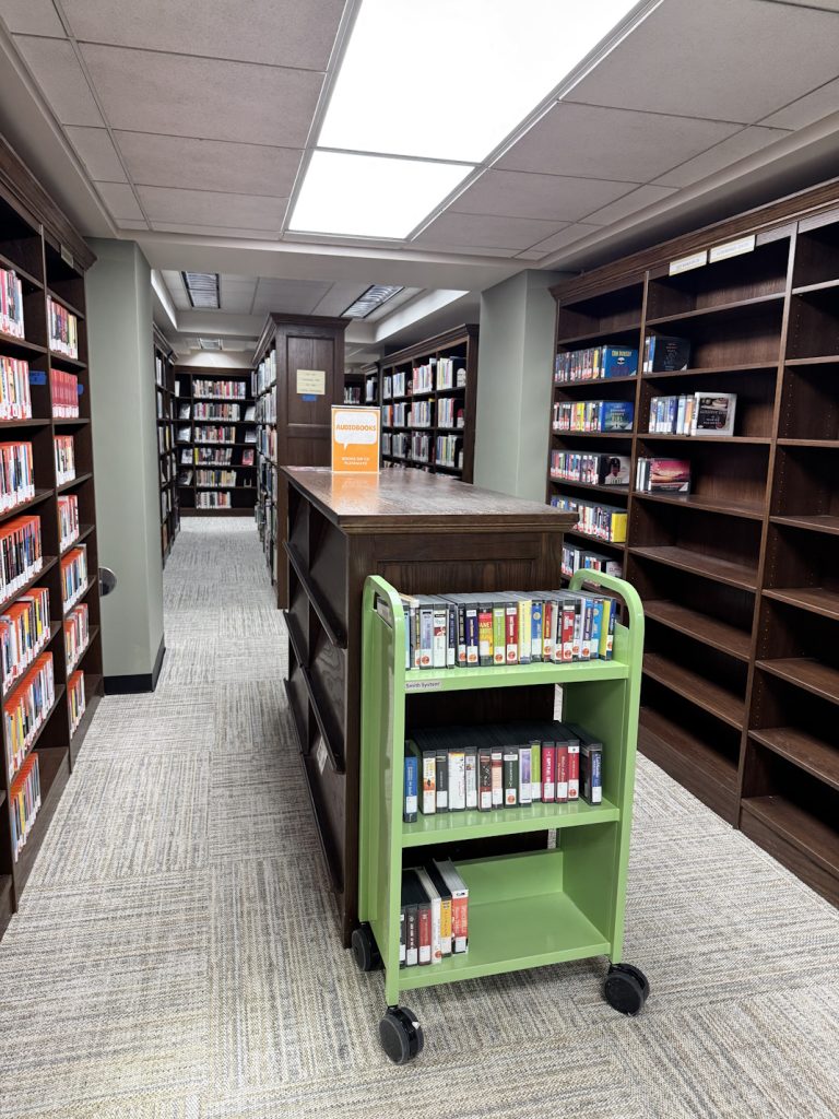 Books returned to the non-fiction area shelves with new carpet
